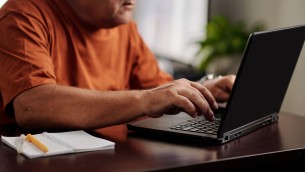 aged-man-working-laptop-2023-11-27-04-53-26-utc.jpg